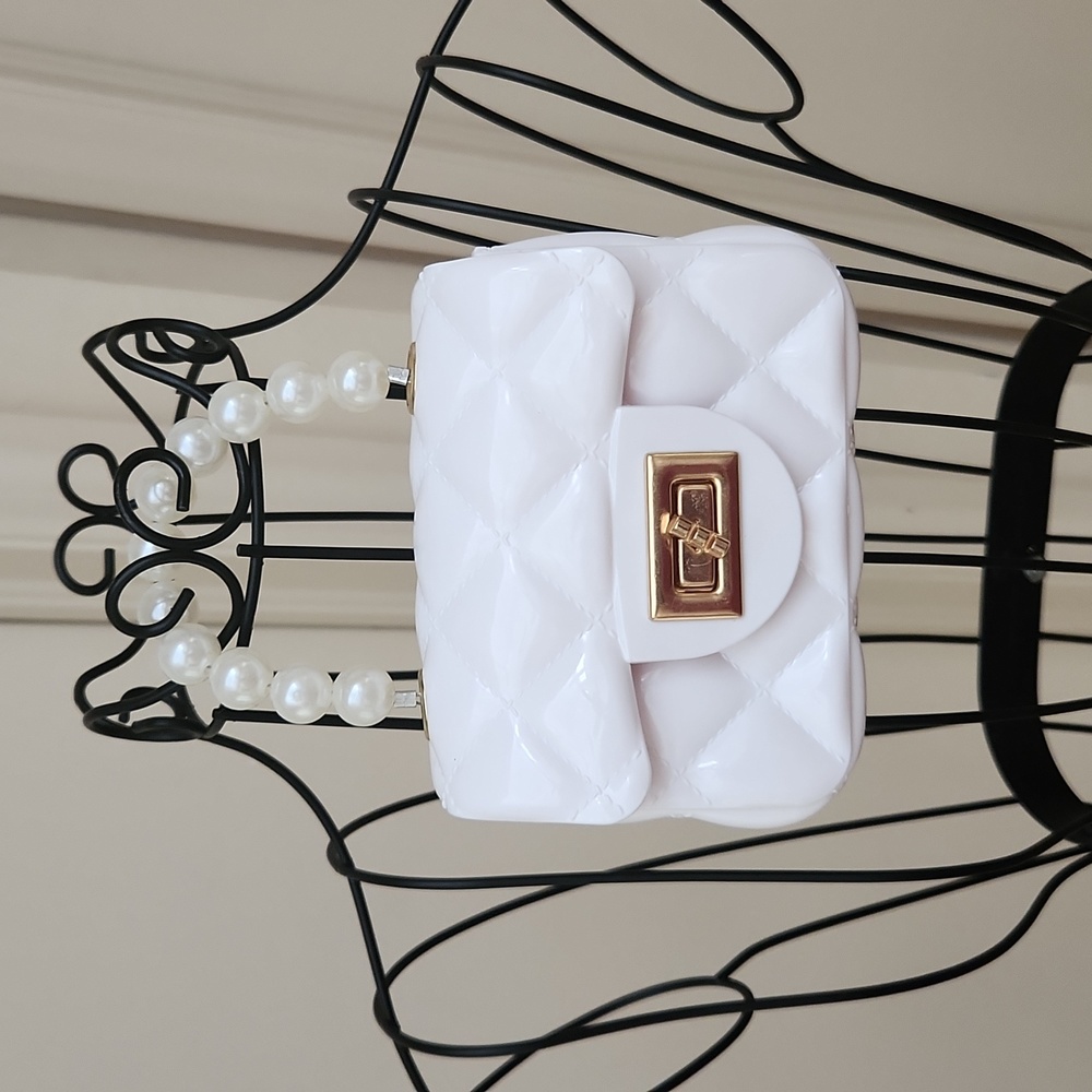 White purse, vinyl, child's